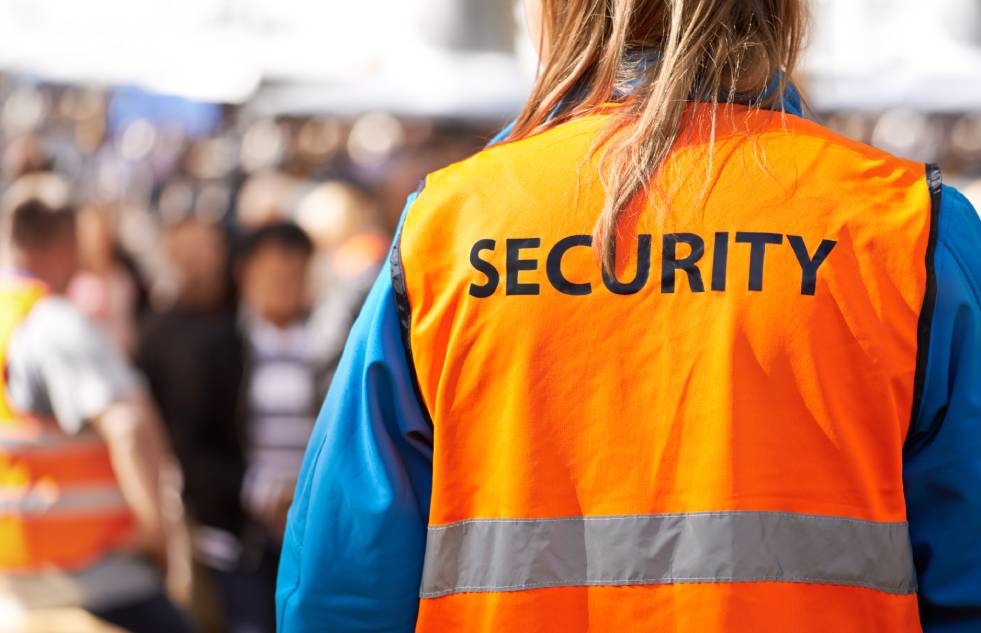 Woman with security vest